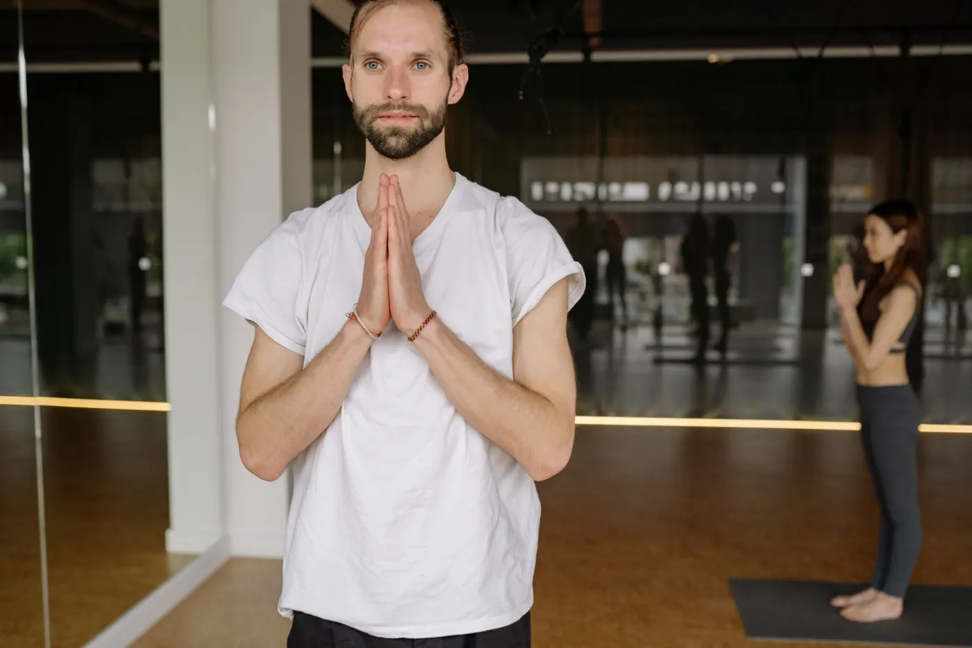 A yoga teacher in the studio